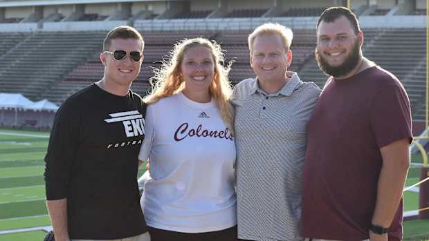 Thomas Bowling, Kristen Peterson and Zach Vigliotti with Walt Wells.